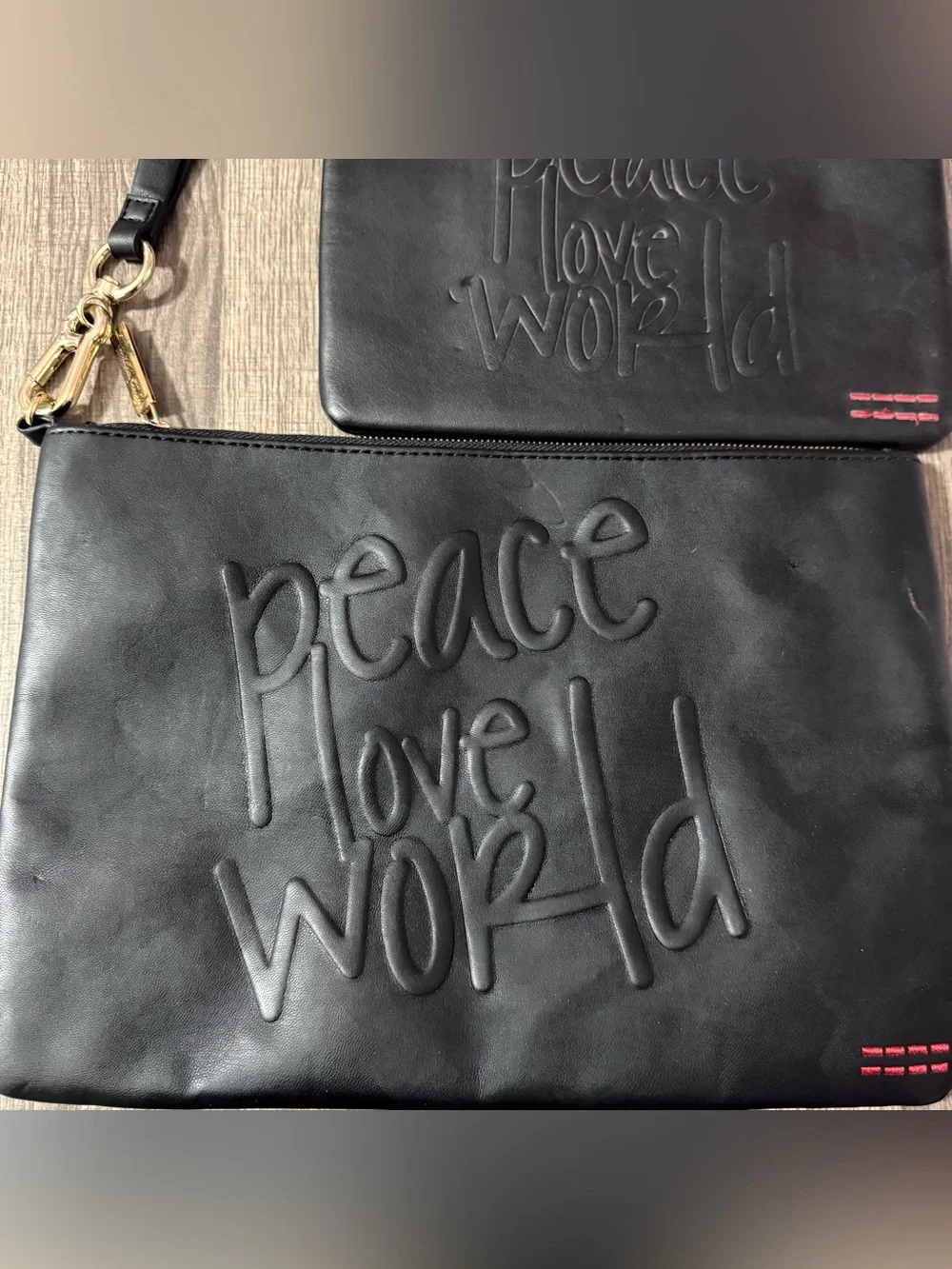 2 Peace Love World Black Embossed Leather Clutch Wristlets